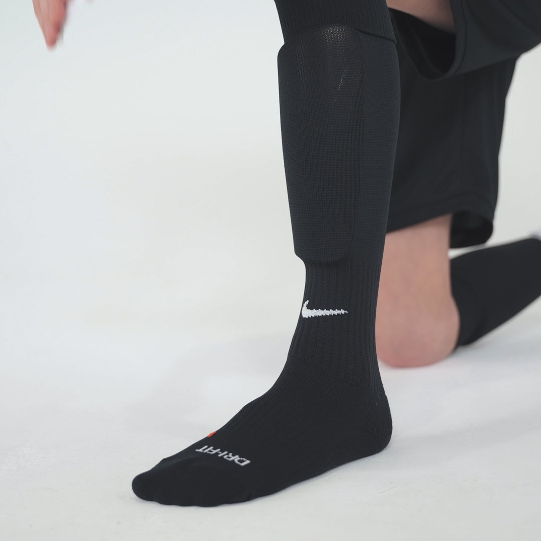 Schienbeinschoner Halter